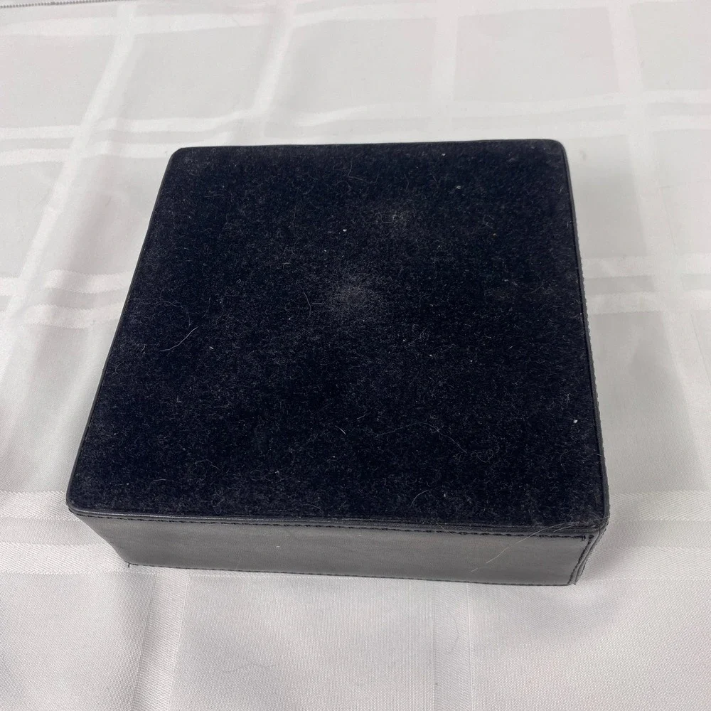Source Unknown square leather